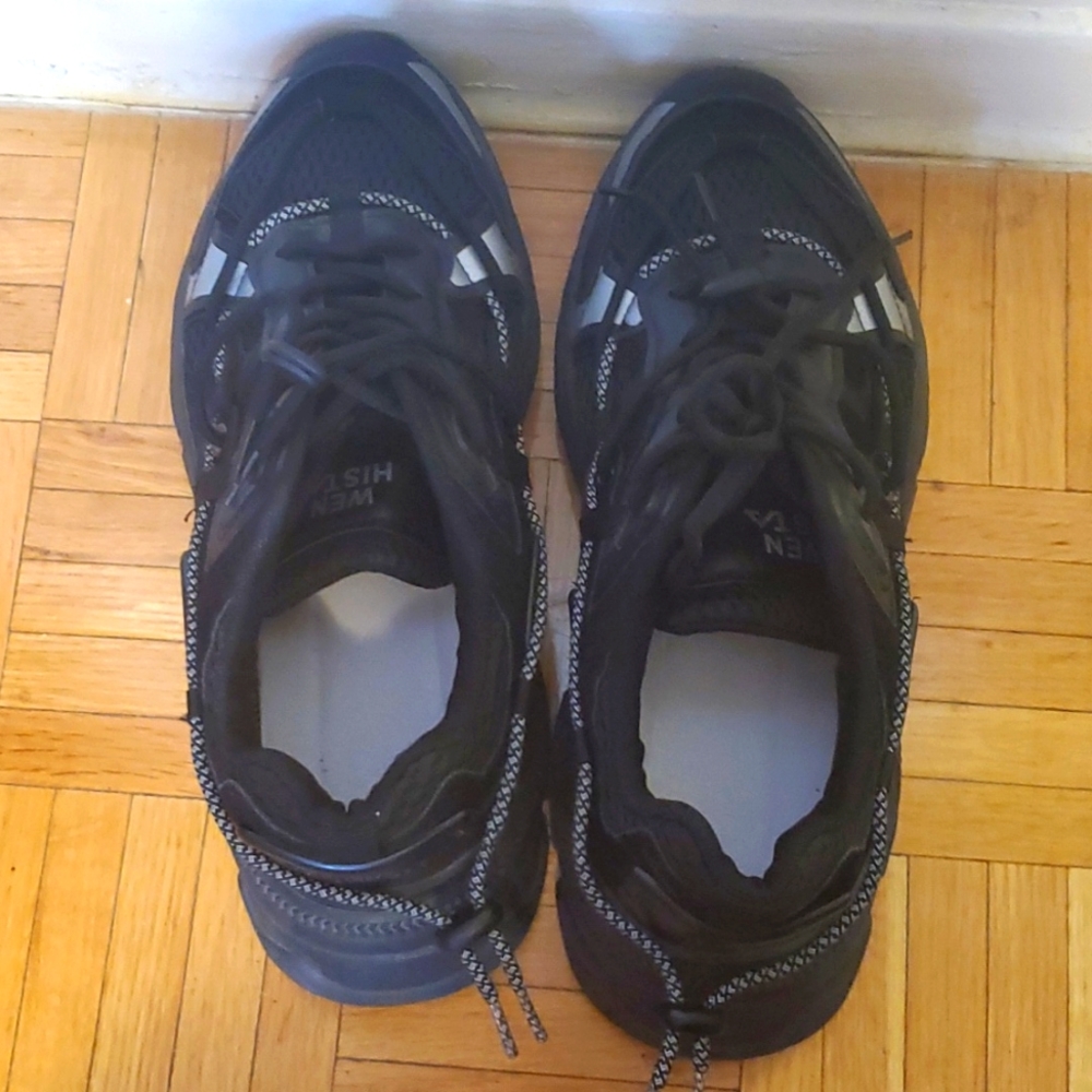 Black sneakers with reflective detail